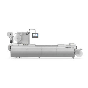 滚筒给料加热成型机