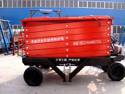 带轮剪叉式升降机 - a11001 - Jinan Juxin Machinery Co., Ltd. - 室内、室外 / 全地形 / 工业用途