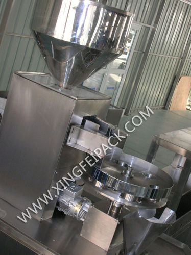 颗粒定量分配机 - Shanghai Xingfei Packaging Machinery Co., Ltd. - 容积式 / 自动 / 旋转托盘式