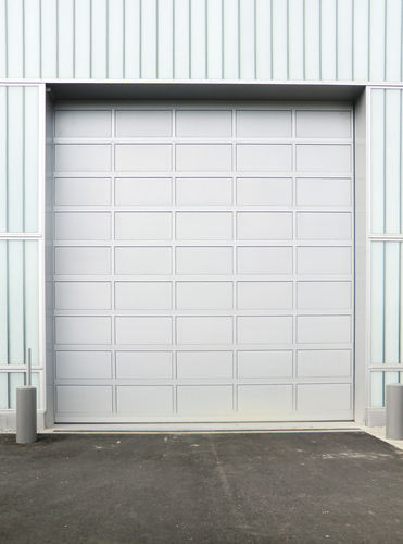 分段大门 - ACOUSTICLINE 29-35 DB - Jansen Tore GmbH & Co.KG - 立式 / 工业 / 电镀钢