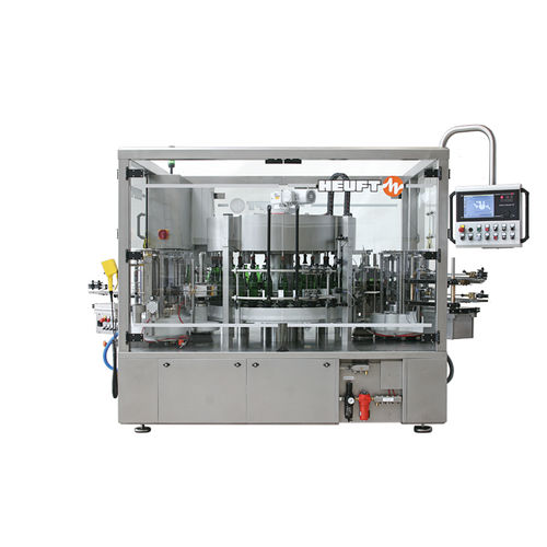自动标签机 - TORNADO W - HEUFT SYSTEMTECHNIK - 瓶子 / 用于饮料产业 / 热熔胶