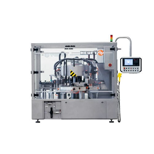 自动标签机 - TORNADO R - HEUFT SYSTEMTECHNIK - 瓶子 / 缠绕式 / 用于饮料产业